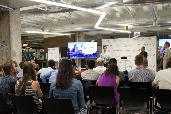 Sitted people carefully listening to someone